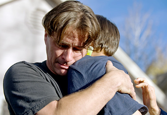 Criminal Richard Heene hugging son